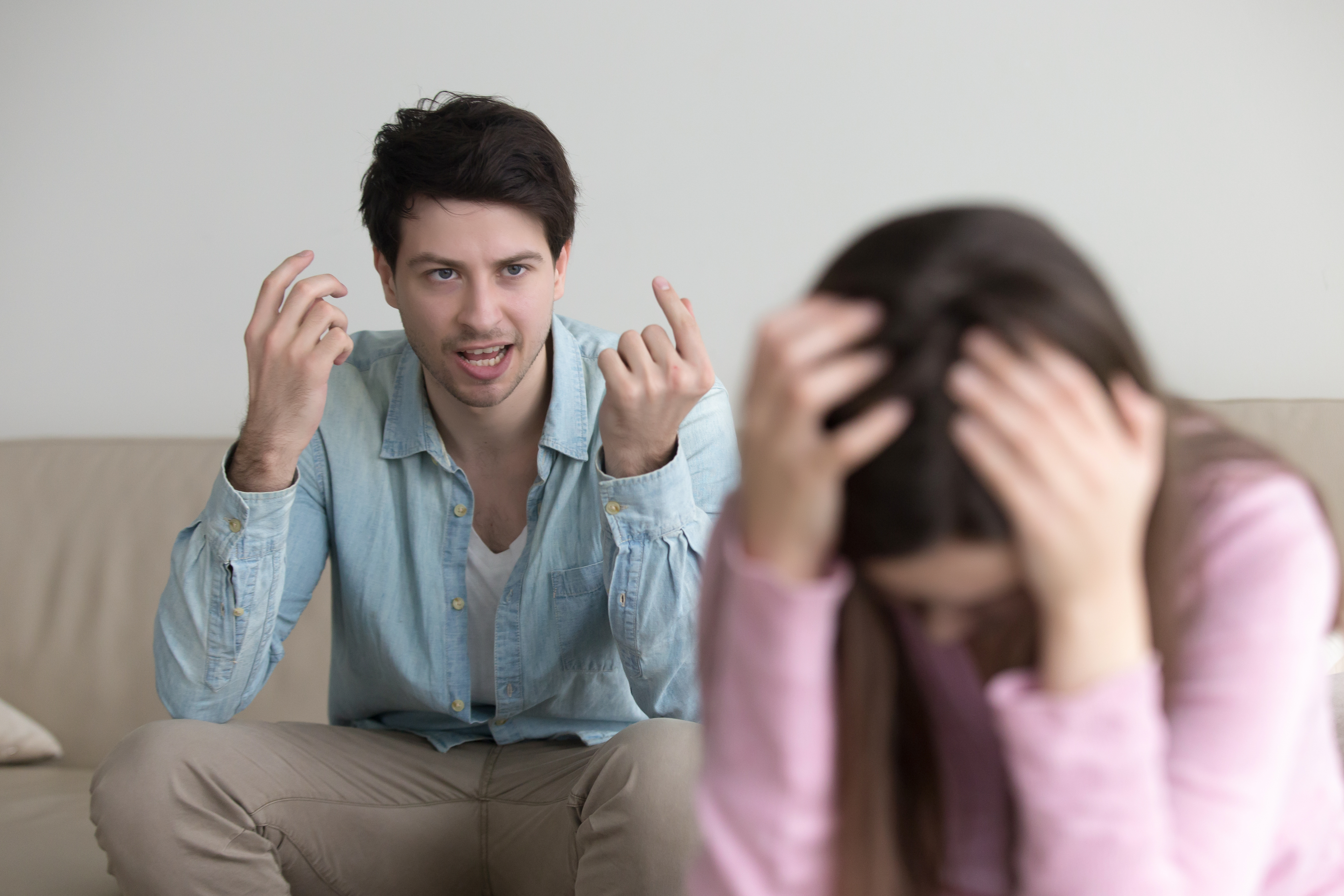 A man and woman arguing | Source: Shutterstock